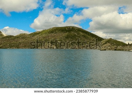 Mountains of the North Caucasus. Sophia Lake. Reflection of mountains in the lake, picture taken from the shore