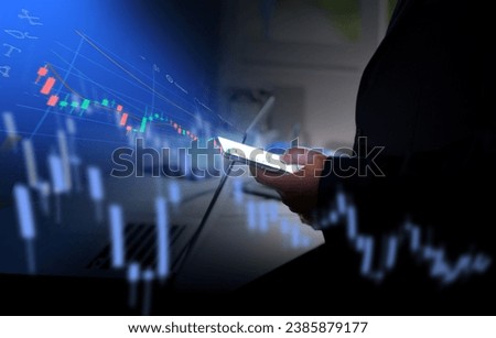 planning and strategy stock market hands of a businessman working with a smartphone Technical price charts and indicators red and green candlestick chart and mobile screen backgrounds for trading 