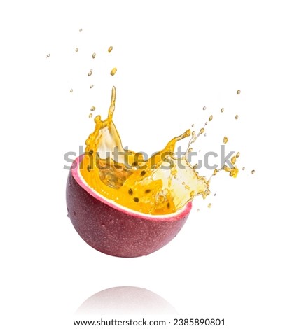 Red passion fruit with passionfruit juice splash flying in the air isolated on white background. Royalty-Free Stock Photo #2385890801