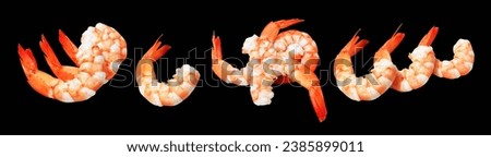 Red boiled shrimp or tiger prawn isolated with clipping path, no shadow on black background, peeled cooked seafood