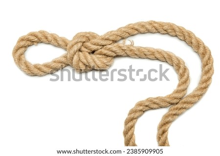 Coiled rope knot isolated over a white background Royalty-Free Stock Photo #2385909905