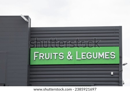 Fruits et legumes sign text facade words in french means Fruits and vegetables entrance building food store