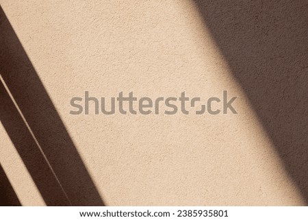 background of yellow wall in sunlight