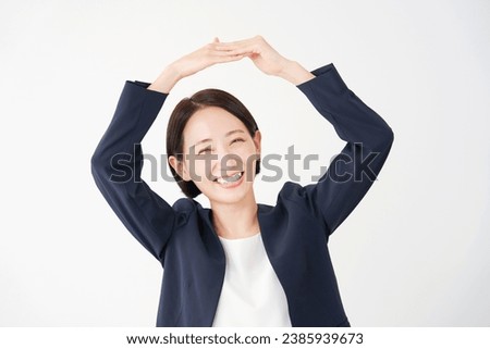 Asian businesswoman O sign gestures in white background
