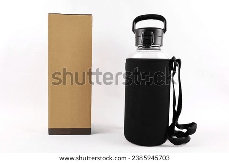 Stainless Steel Thermos with a black hanging bag on a white background