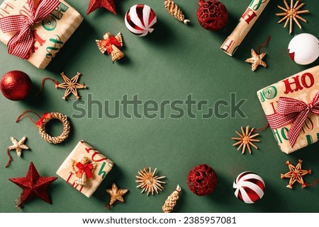 Festive Christmas frame: Gift boxes and vintage decor on green background