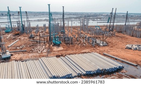 Spun Pile foundation work. Aerial view of large scale pile foundation work. Royalty-Free Stock Photo #2385961783