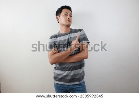 Portrait of a man on white background, person on gray background