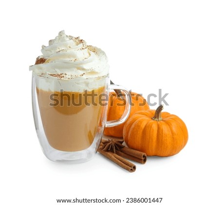 Cup of pumpkin spice latte with whipped cream, squashes and cinnamon sticks isolated on white Royalty-Free Stock Photo #2386001447