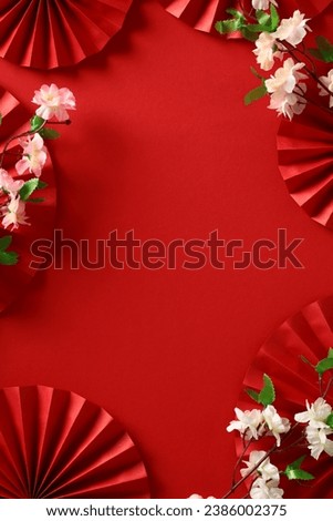 Chinese New Year 2024 Poster: Folding Paper Fans and Sakura on Red Background - Abstract Asian Art Celebration Royalty-Free Stock Photo #2386002375