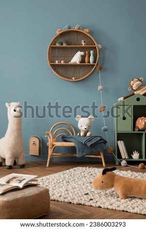 Interior design of warma nd cozy kid room interior with wooden shelf, blue wall, plush toys, lama, mouse, monkey, braided rug, green shelf and. personal accessories. Home decor. Template. 