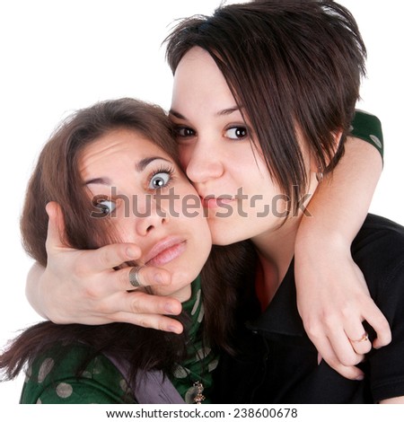 closeup image of the young pretty girls embracing