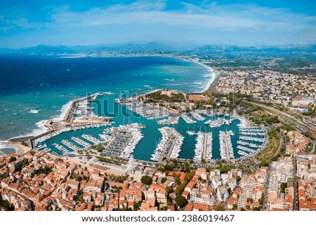 Antibes port aerial panoramic view. Antibes is a city located on the French Riviera or Cote d'Azur in France. Royalty-Free Stock Photo #2386019467