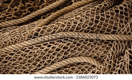 industrial fishing net with ropes as background Royalty-Free Stock Photo #2386025073