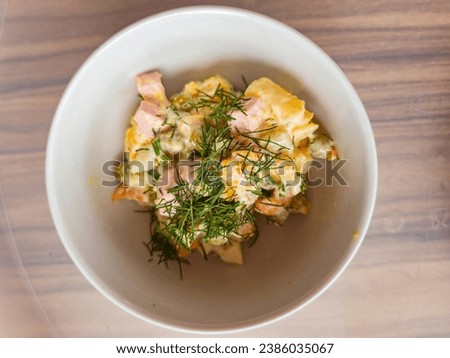 Olivier's salad on the table in a plate