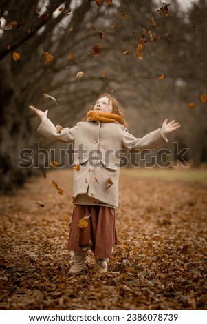 Girl in autumn park in the evening