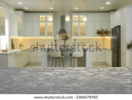 Empty grey textured table in kitchen, space for design