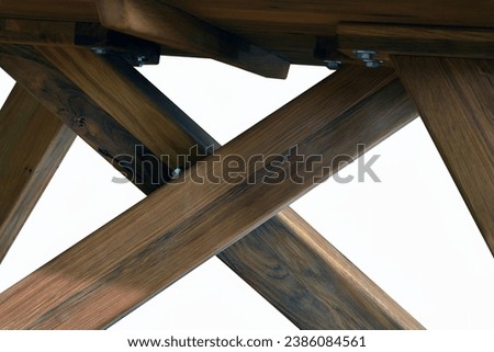 Wooden table surface. Natural wood furniture close view photo background. Solid wood table top and legs. Eco furniture production, manufacturing