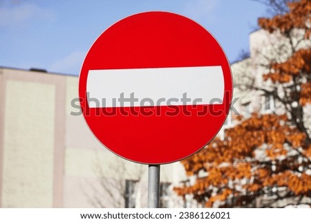 Private property road sign. No entry road. Vehicles restricted. Round red road sign with white rectangle inside. Car traffic prohibited.
