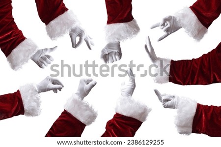 Detail of set of gestures with the arm of Santa Claus dressed in traditional clothing and white gloves. Royalty-Free Stock Photo #2386129255