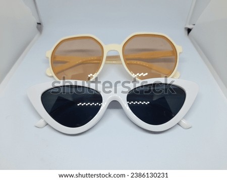 fashion glasses - eyewear accessories with unique designs that are much sought after by adults are photographed on a white background