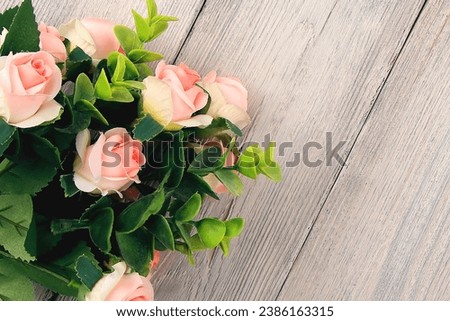 Roses are flowers. Bouquet of saffron, chrysanthemums, lilies, tulips.On a wooden background.For my birthday. Valentine's Day. for weddings.The concept of the holiday.For the designer.postcards 