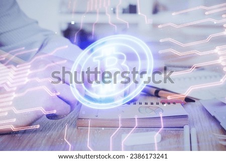 Man's hands working with notes background. Cryptocurrency and finance concept. Double exposure.