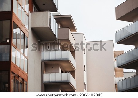 Luxurious apartments for sale. Bialystok city in Poland architecture background. High block of flats living area. New build neighborhood modern style. Real estate market in Europe. Royalty-Free Stock Photo #2386182343