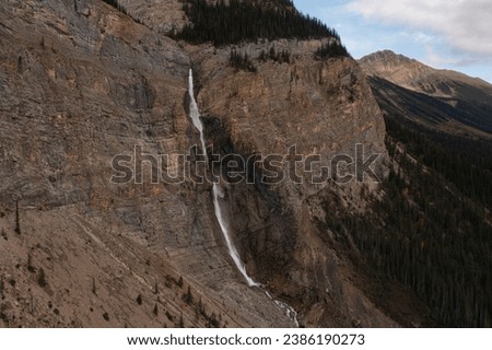 Amazing aerial view of Takakkaw Falls in Yoho National Park on a rainy day