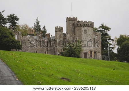 A Scottish castle on a hill.