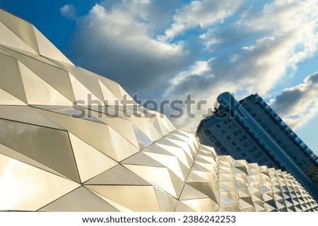 The wavy structure of the facade of a modern building