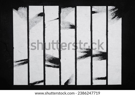 Strips of white paper on a black background. Abstract background. Royalty-Free Stock Photo #2386247719