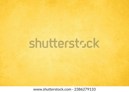 Yellow concrete stone texture for background in summer wallpaper. Cement and sand wall of tone vintage minimal. Concrete abstract wall of light yellow color, cement texture white blank for home decor. Royalty-Free Stock Photo #2386279133