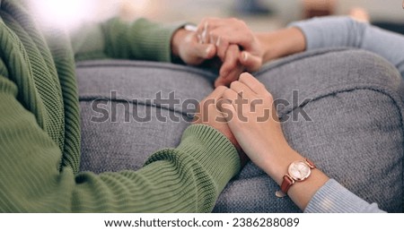 Closeup, home and couple with love, holding hands and support with romance, bonding together and relax. Romantic, man and woman with connection, affection and marriage with relationship and apartment Royalty-Free Stock Photo #2386288089