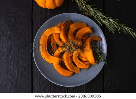 Baked pumpkin with fresh rosemary