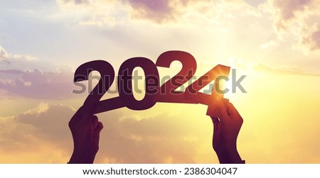 Hands holding 2024 year Happy new year to plan and starting new life concept.
Hands holding 2024 year Happy new year to plan and starting new life concept.
