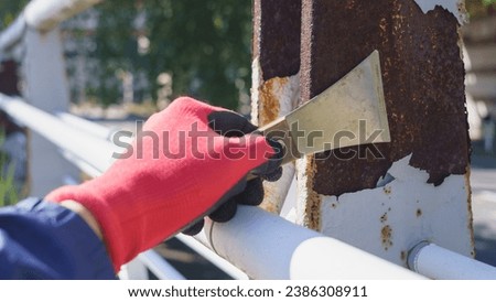 Repair rust on iron parts. Royalty-Free Stock Photo #2386308911