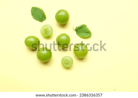 Bunch of fresh Sweet Green Shine Muscat (Vitis vinifera) grape isolated on yellow backdrop.green grapes. Japanese grapes.Grapes green taste sweet growing natural.
 Royalty-Free Stock Photo #2386336357