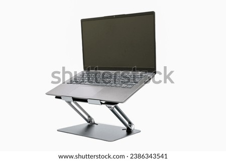 laptop holder desk black aluminum metal isolated on white, helps keep your sitting position good.
