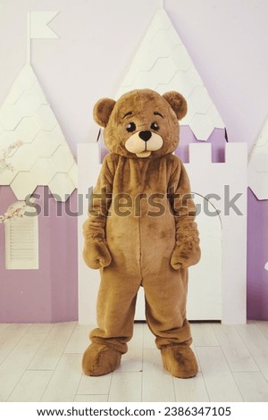 bear costume for celebrating holidays, entertainment for children and adults Royalty-Free Stock Photo #2386347105