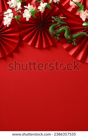 2024 Chinese New Year Poster: Dragon, Sakura, and Folding Fans on Red Background