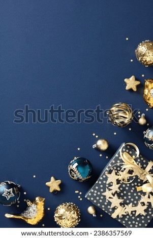 Elegant navy Christmas background with gold glitter baubles, gift box, stars. Perfect mockup for holiday cards and invitations 
