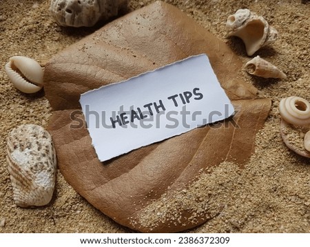 Help tips writing on beach sand background.