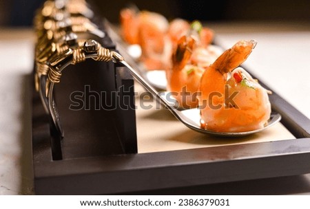Versatile image of raw or cured prawns is adaptable across contexts, making it suitable for seafood restaurant menus, culinary blogs, seafood market promotions, cookbook covers, restaurant ambience.