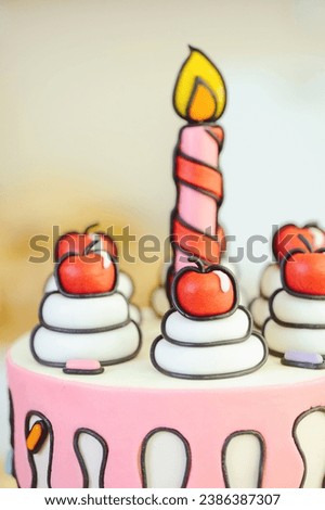 a beautiful cake made in a cartoon style with a candle and cherries in a bright, close-up
