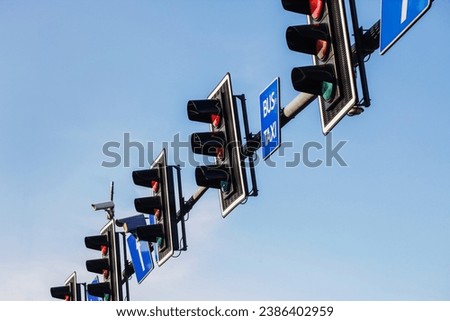 Red traffic light background. Big intersection. Stop light. Long metal pipe. Simple empty copy space background. Road warning. Safety rules. Do not drive. Wait for green. Overhead semaphores.