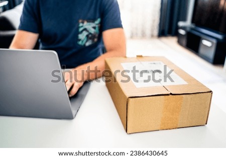 Return product package to online shop. Order delivery or shipment. Complaint and refund, ecommerce. Shipping wrong box back. Fake scam parcel. Damaged goods. Merchandise warranty. Man and computer. Royalty-Free Stock Photo #2386430645