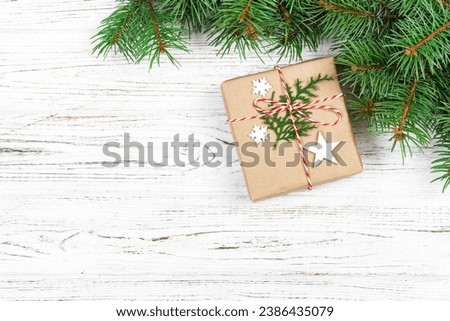 Christmas card with decor and branch, space for text.