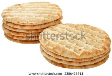 Greek pita bread or flatbread closeup and isolated Royalty-Free Stock Photo #2386438813