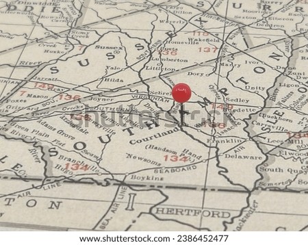 Southampton County, Virginia vintage map marked by a red round tack. Royalty-Free Stock Photo #2386452477